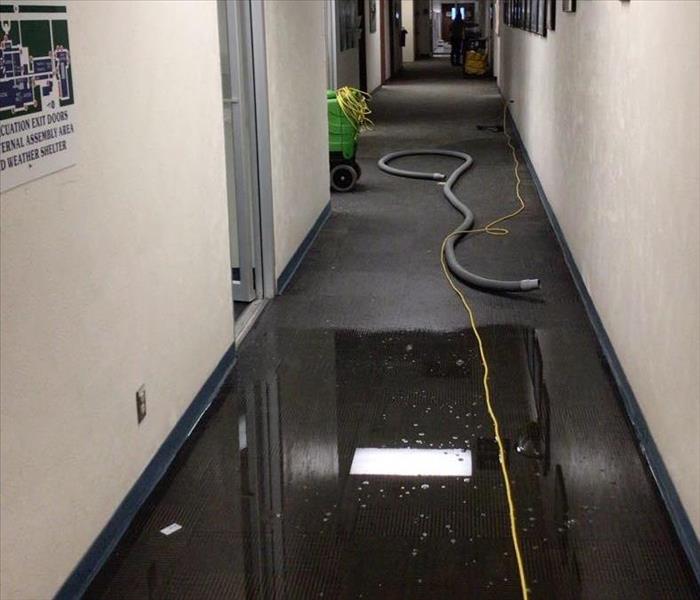 Flooded Dallas Office Hallway 